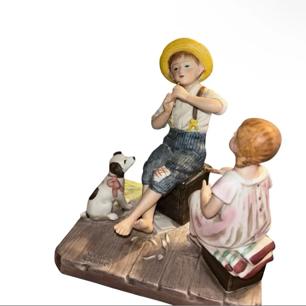 Norman Rockwell Figurine with Yellow Hat and Blue Pants